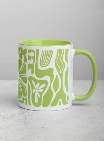 Cermaic mug with green inside plus design