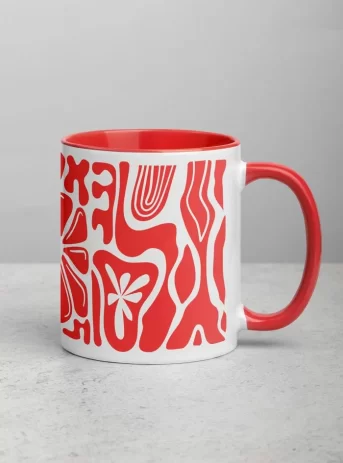 Ceramic mug with red inside plus design